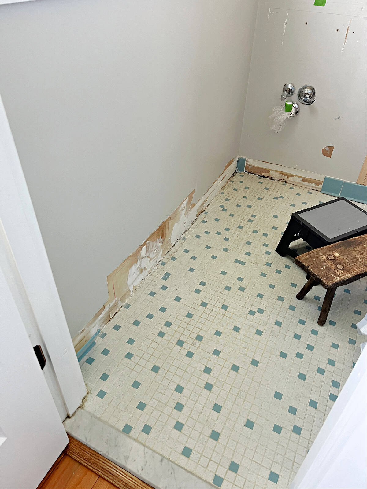 vintage tile floor in small bathroom