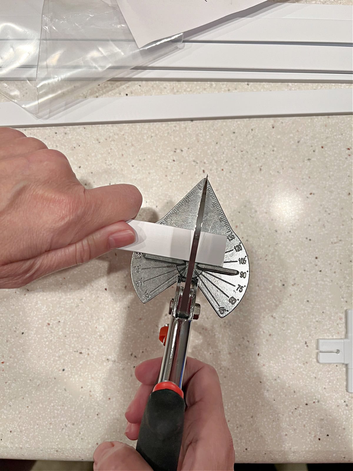 cutting PVC strip with miter shears