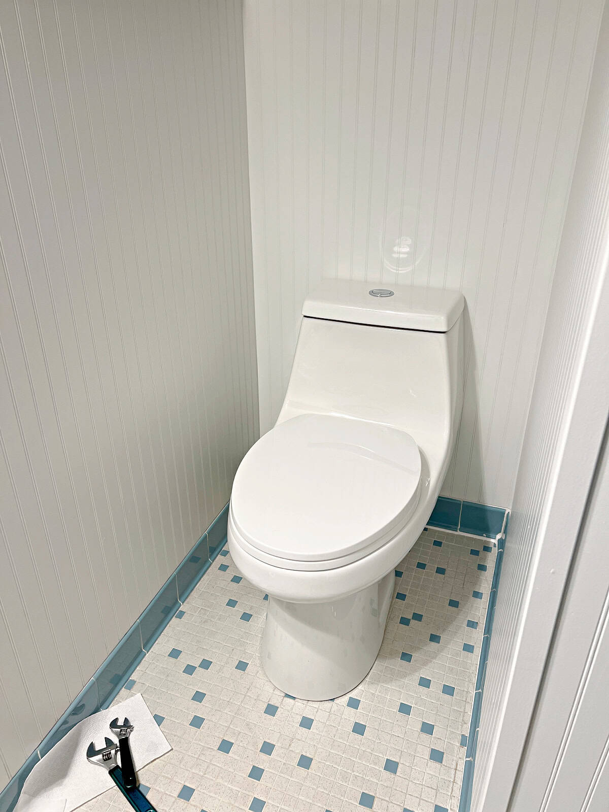 new toilet in small bathroom