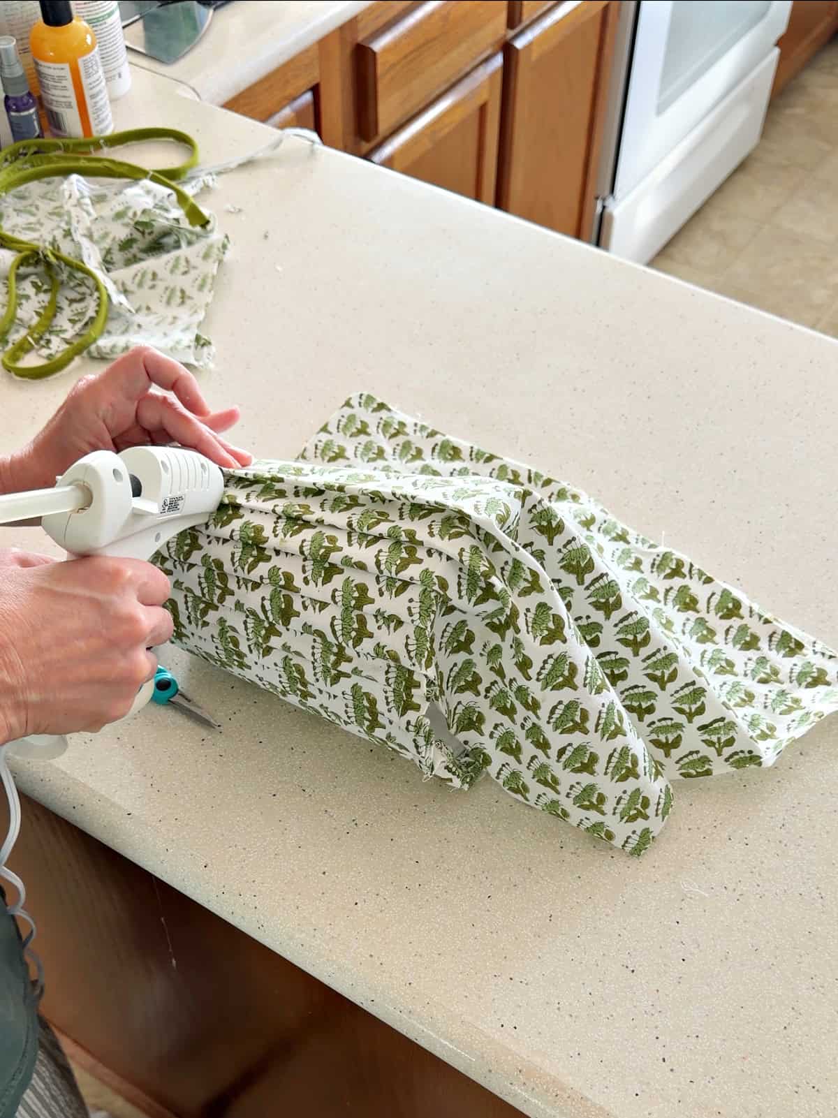 using hot glue to glue fabric on a lampshade